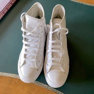 All white leather high top converse